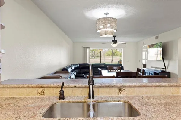 a kitchen with counter top space and a sink