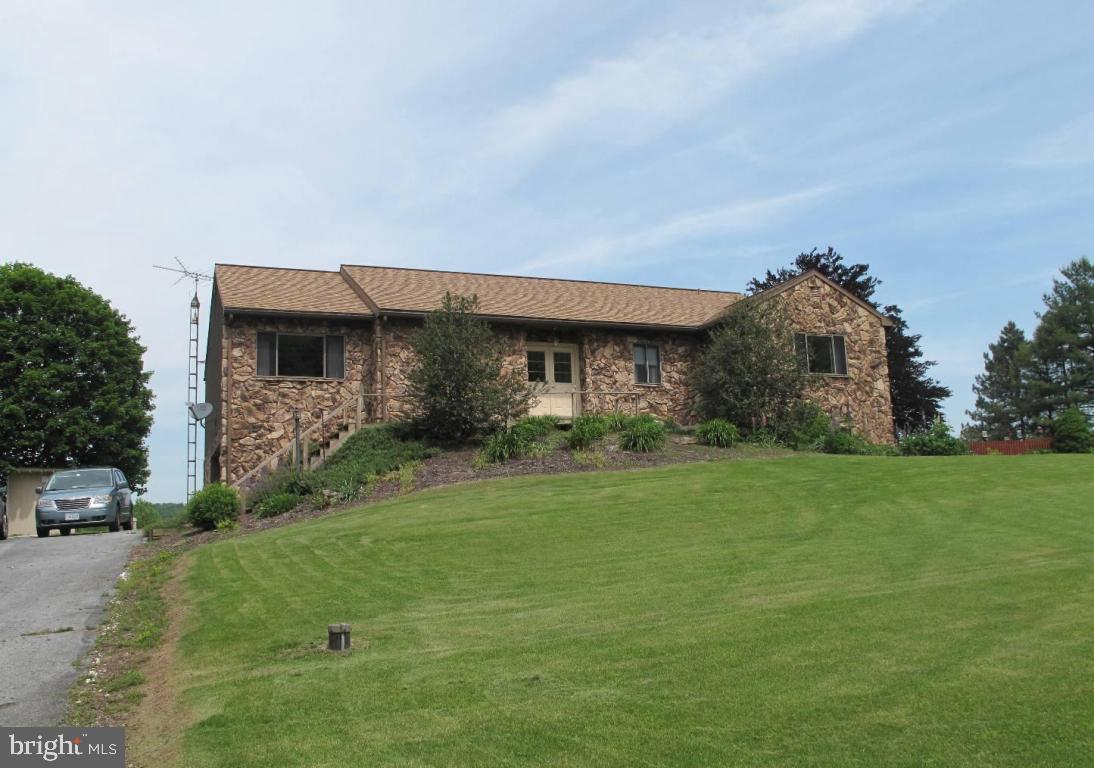 1178 Cider Press Road Manheim, PA 17545 - Photo 1 of 31 a front view of a house with garden