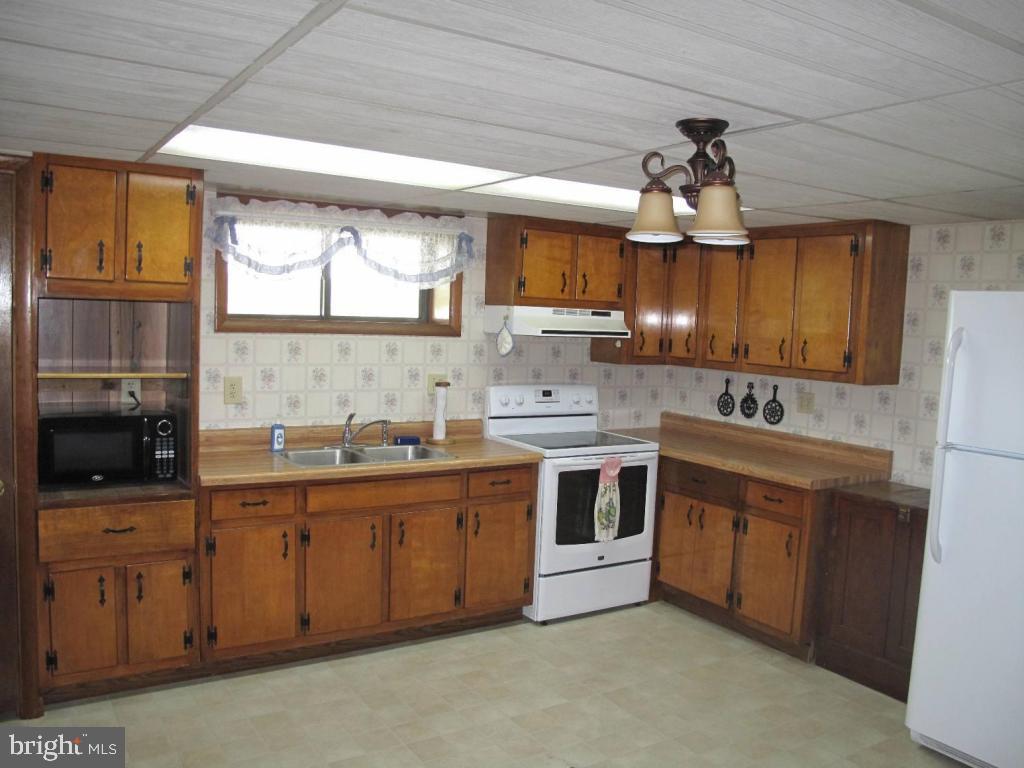 1178 Cider Press Road Manheim, PA 17545 - Photo 21 of 31 a kitchen with a sink appliances and cabinets