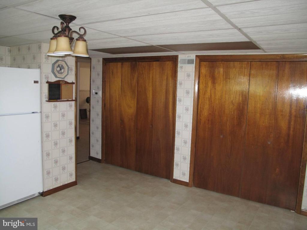 1178 Cider Press Road Manheim, PA 17545 - Photo 22 of 31 a view of a hallway with wooden walls
