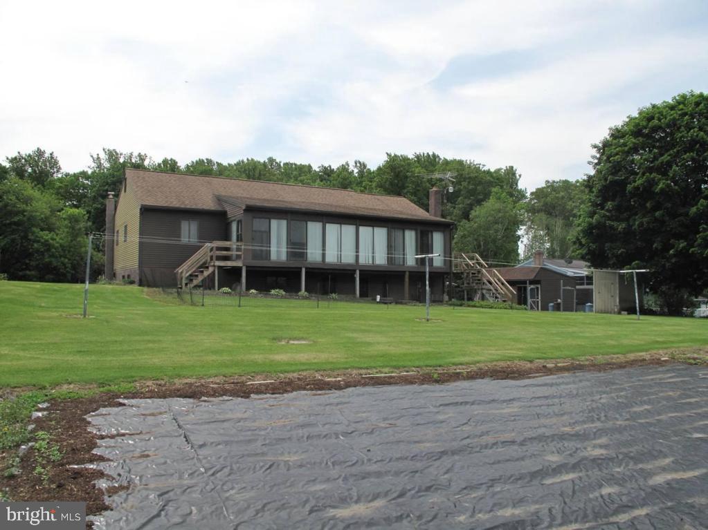 1178 Cider Press Road Manheim, PA 17545 - Photo 29 of 31 a front view of a house with a yard and trees