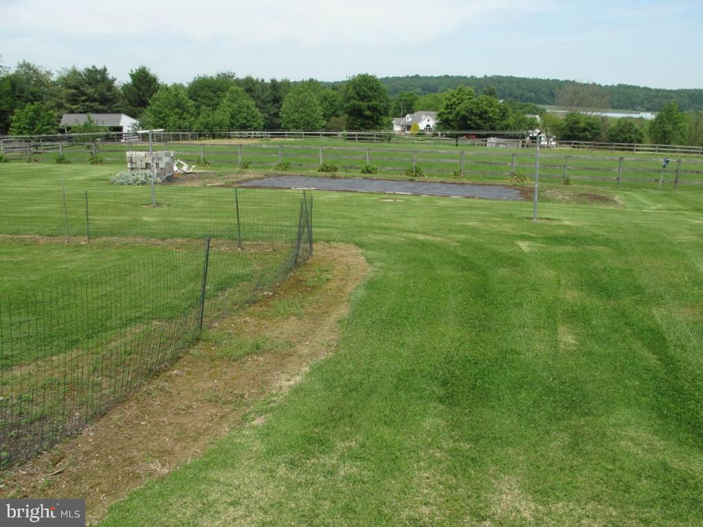 1178 Cider Press Road Manheim, PA 17545 - Photo 31 of 31 a view of a green field with wooden fence