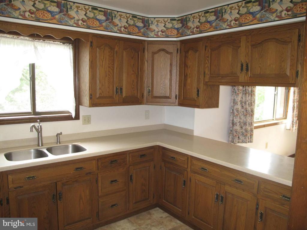 1178 Cider Press Road Manheim, PA 17545 - Photo 5 of 31 a kitchen with a sink and cabinets