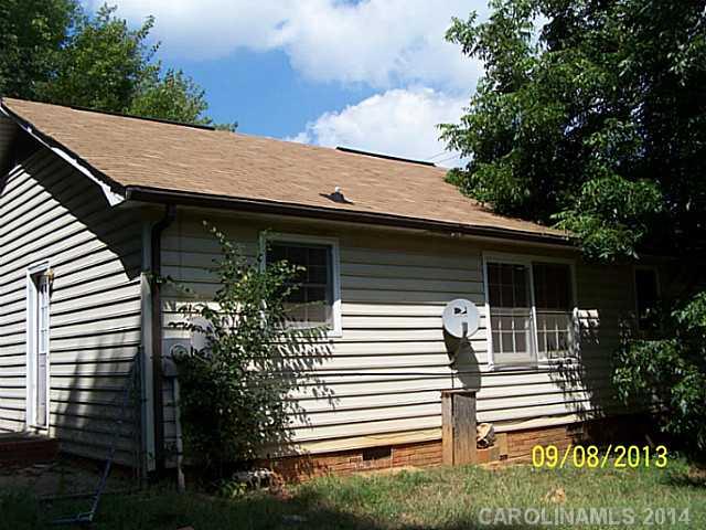 1607 Rushing Street Monroe, NC 28112 - Photo 2 of 4 a view of a house with a yard