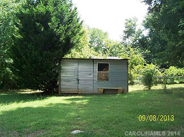 1607 Rushing Street Monroe, NC 28112 - Photo 3 of 4 a view of a backyard