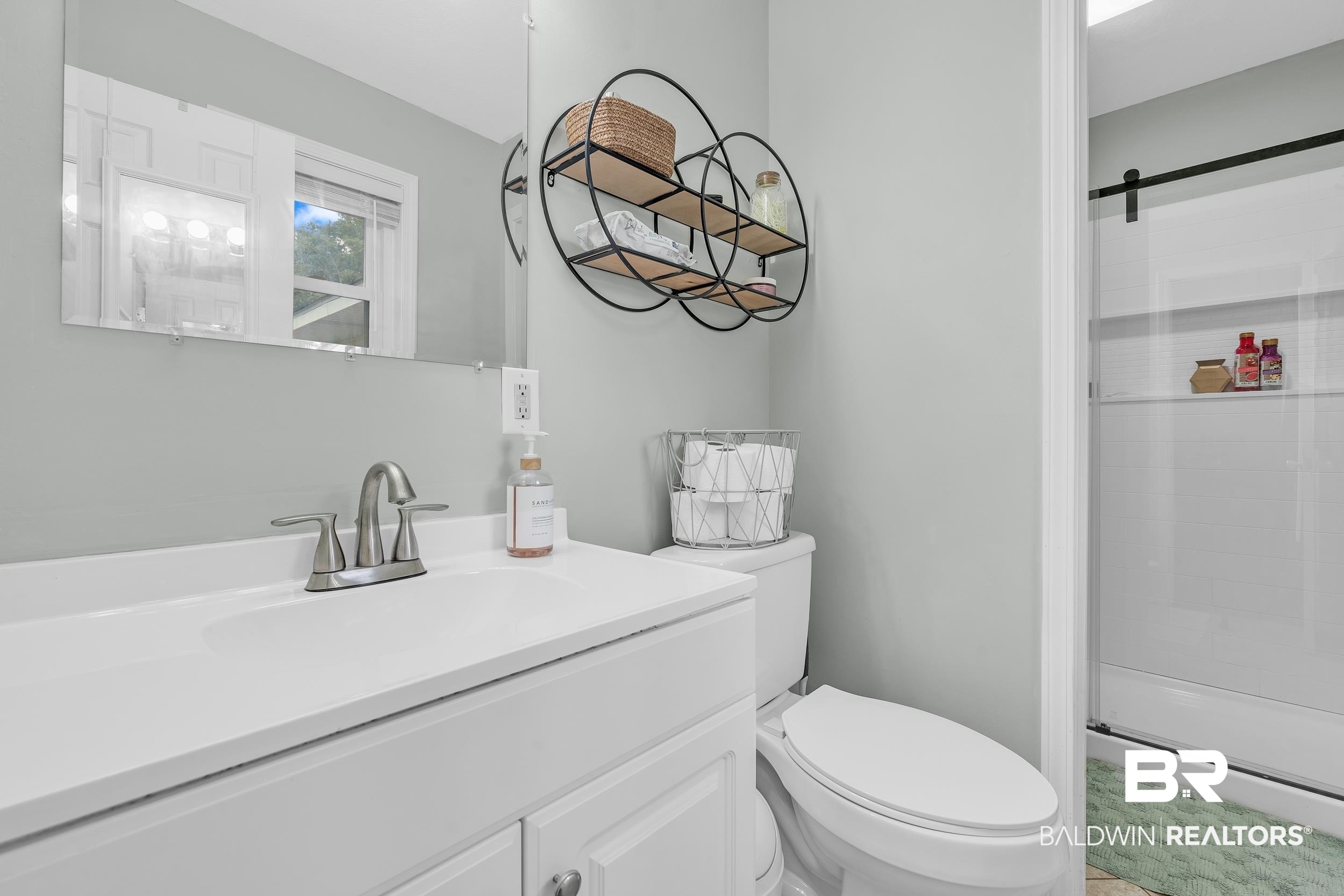 206 West Jackson Avenue Summerdale, AL 36580 - Photo 22 of 37 Full bath featuring a shower stall, toilet, and vanity