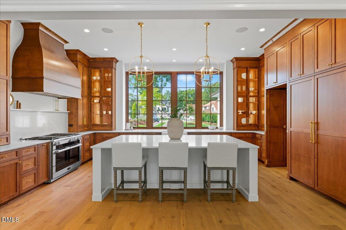 1216 Barcroft Place Raleigh, NC 27615 - Photo 16 of 91 a view of a dining room with furniture window and wooden floor