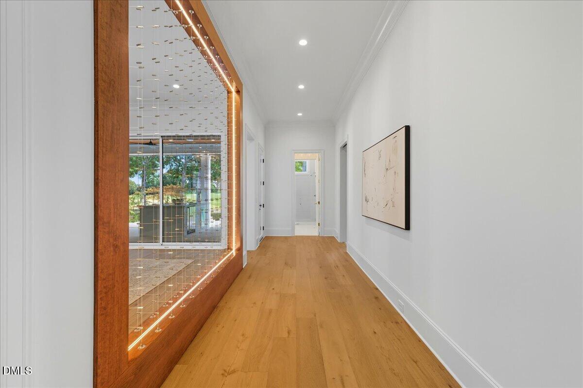 1216 Barcroft Place Raleigh, NC 27615 - Photo 23 of 91 a view of hallway with a large window
