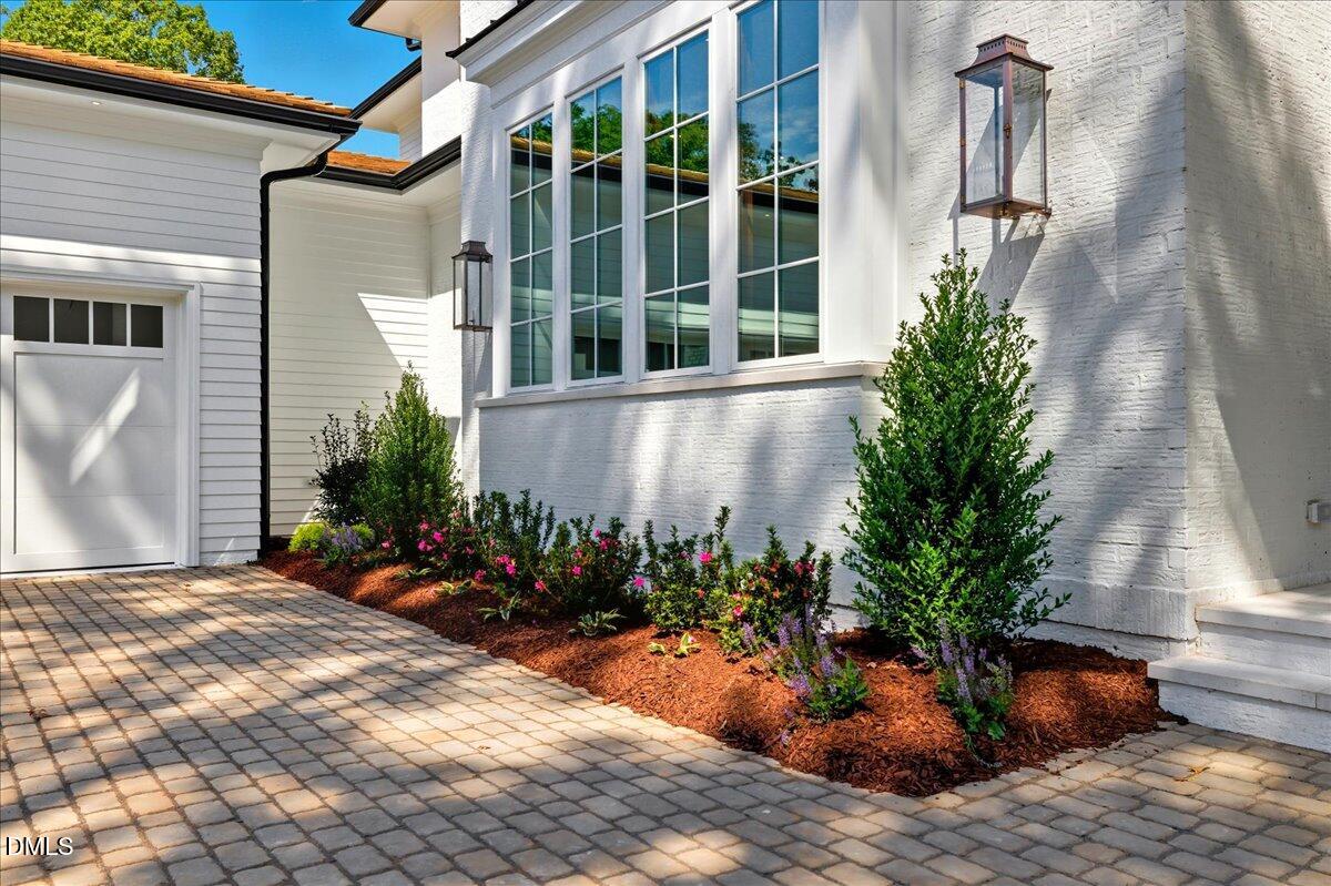1216 Barcroft Place Raleigh, NC 27615 - Photo 7 of 91 a view of a backyard with potted plants
