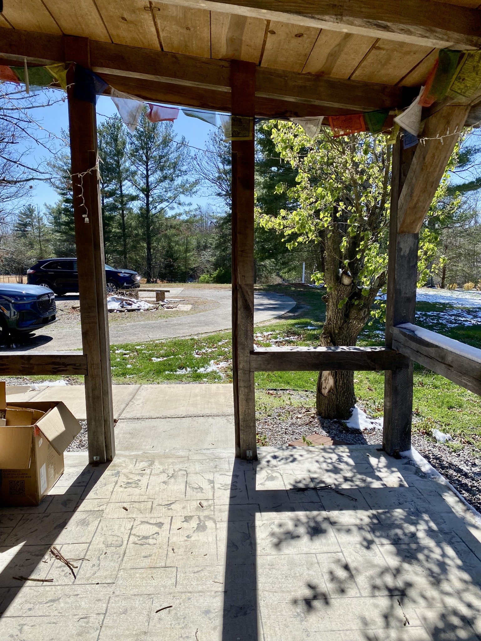 164 Rattlesnake Road McMinnville, TN 37110 - Photo 11 of 45 a view of a porch with a table chairs and a yard