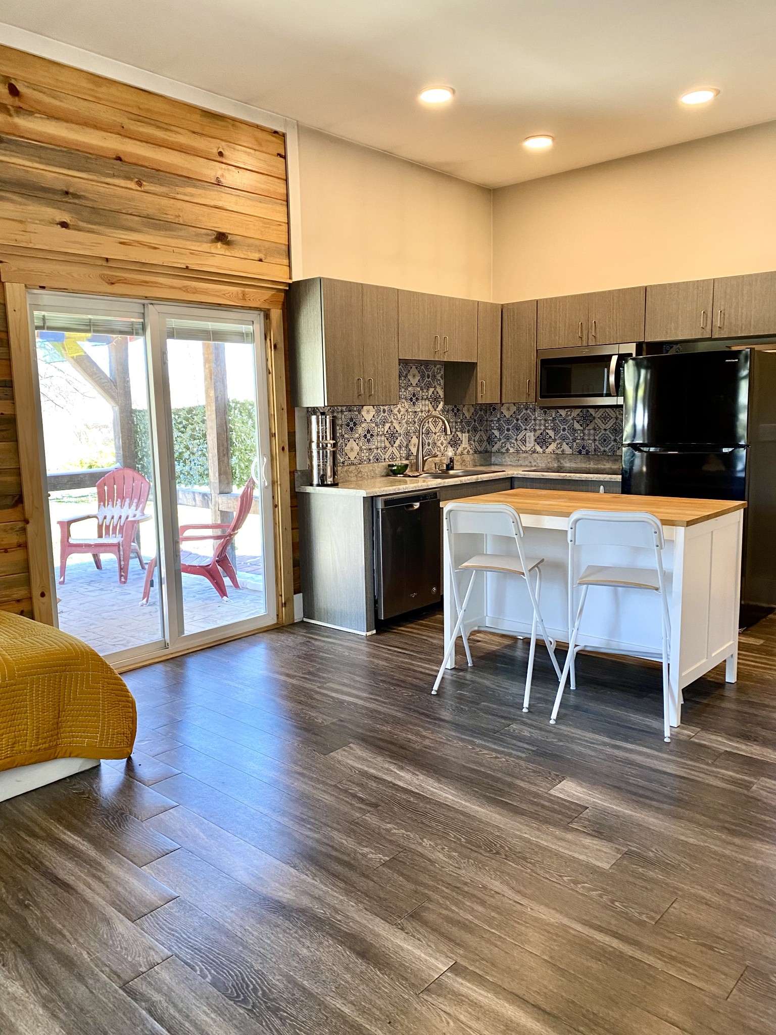 164 Rattlesnake Road McMinnville, TN 37110 - Photo 22 of 45 a view of a kitchen with kitchen island and a wooden floor