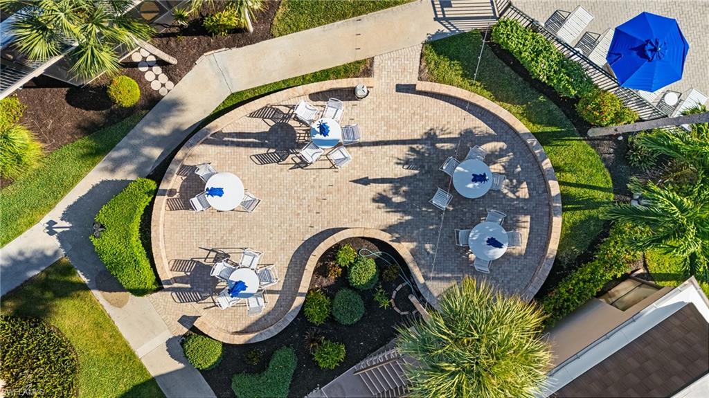 87 North Collier Boulevard, Unit B4 Marco Island, FL 34145 - Photo 22 of 31 an aerial view of a house swimming pool and sitting area