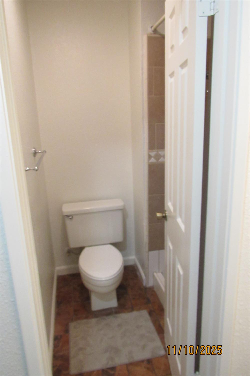 3400 Sullivan Court, Unit 106 Modesto, CA 95356 - Photo 15 of 18 a bathroom with a toilet and a shower