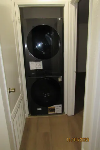 a view of a patio with table and chairs and potted plants