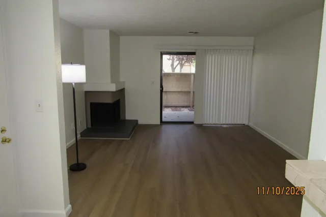 a kitchen with a cabinets and chandelier