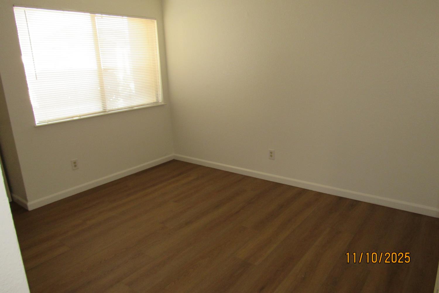 3400 Sullivan Court, Unit 106 Modesto, CA 95356 - Photo 10 of 18 an empty room with a window