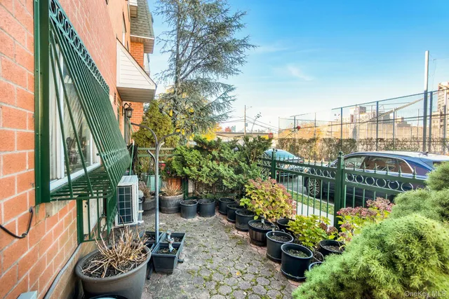 a garden view with a seating space