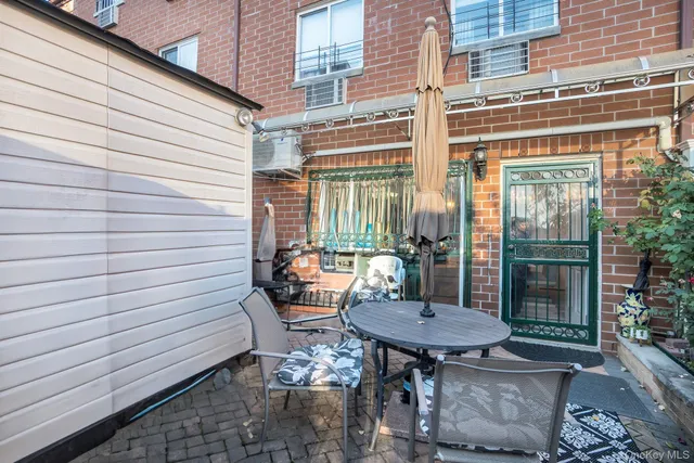 a backyard of a house with seating space