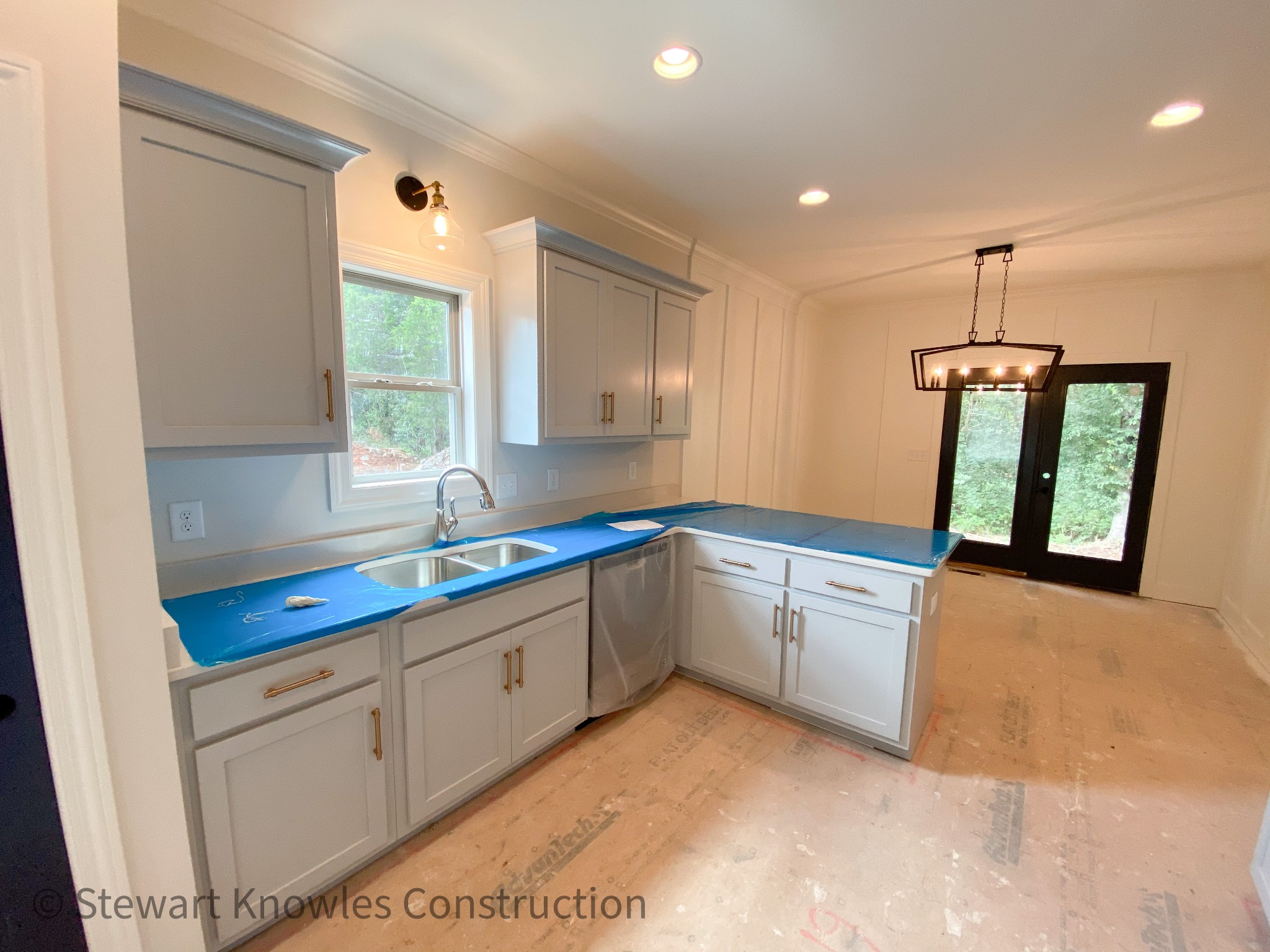 6700 Murfreesboro Road Lebanon, TN 37090 - Photo 5 of 16 a kitchen with granite countertop white cabinets sink and window