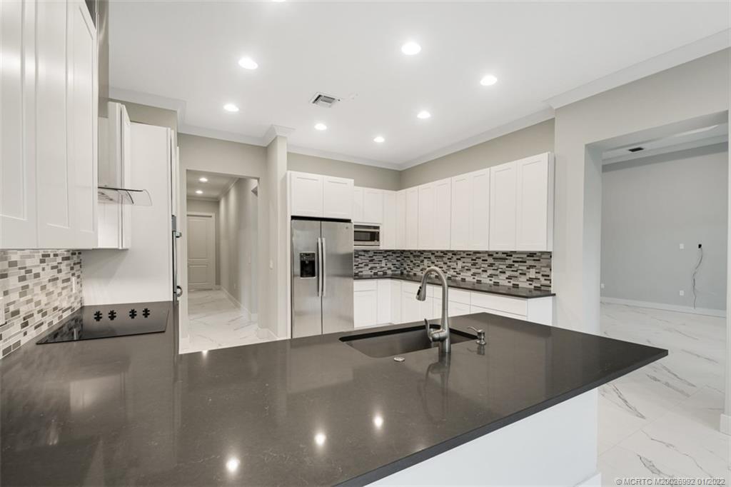 2161 Southwest Oasis Terrace Stuart, FL 34997 - Photo 27 of 72 Kitchen