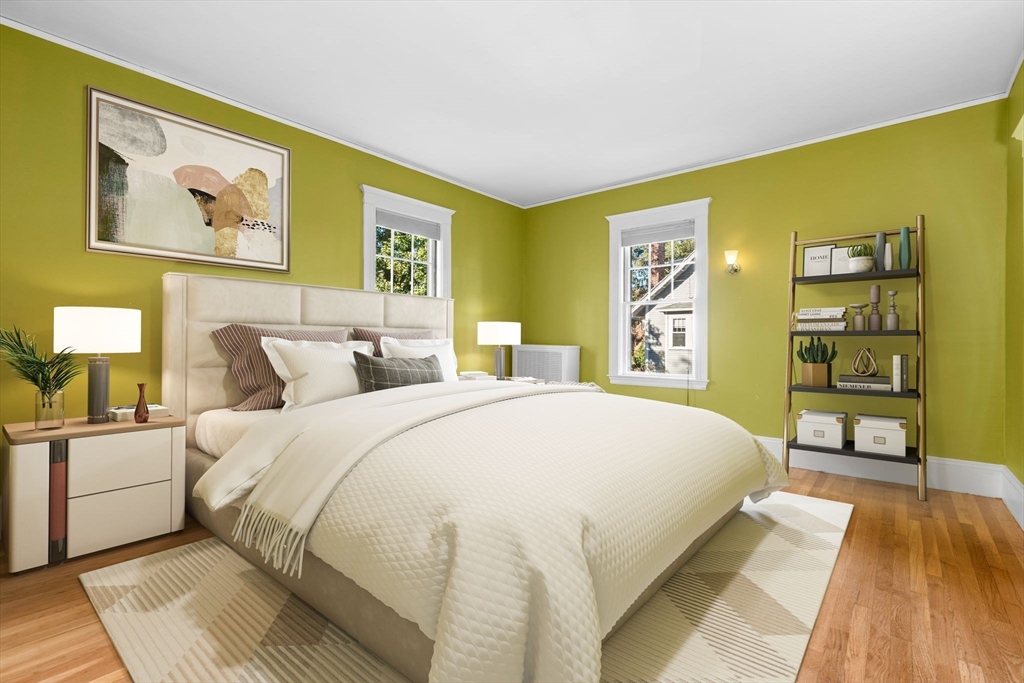 30-32 Goodrich Road Boston, MA 02130 - Photo 20 of 39 a spacious bedroom with a bed and a couch