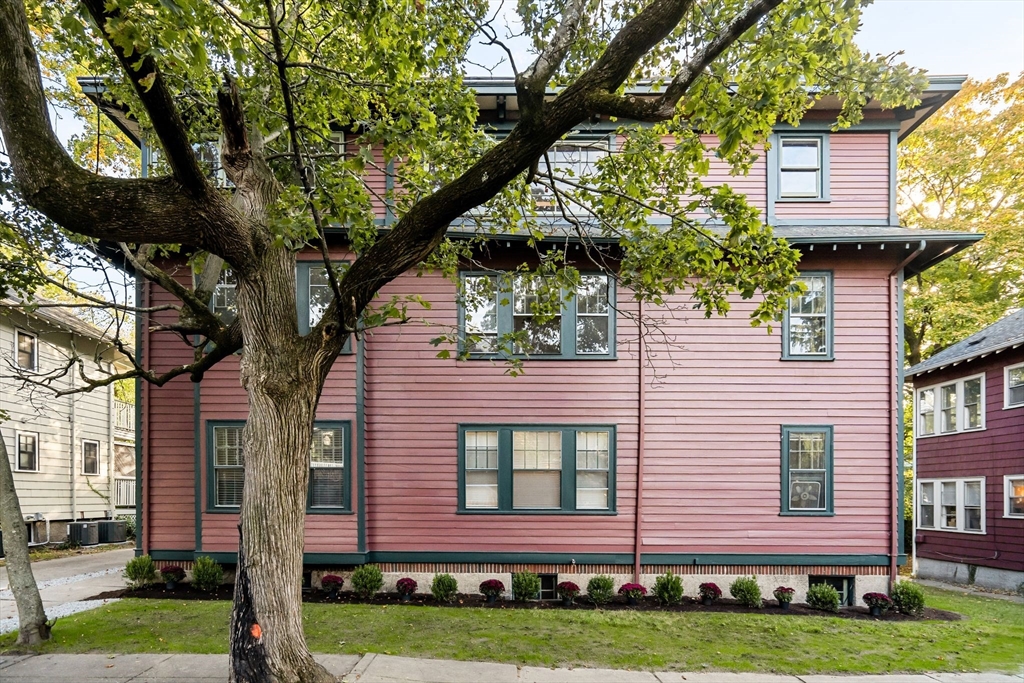 30-32 Goodrich Road Boston, MA 02130 - Photo 2 of 39 a front view of a house with a yard