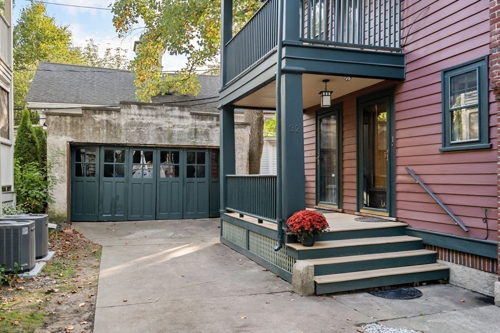 30-32 Goodrich Road Boston, MA 02130 - Photo 36 of 39 a view of backyard with deck and outdoor seating
