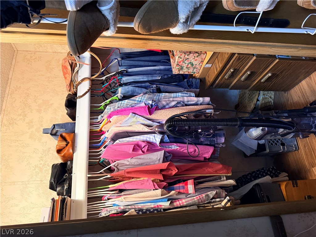 1391 West Dyer Road Pahrump, NV 89048 - Photo 36 of 50 Efficient storage solutions provide ample space for wardrobe organization and household essentials.