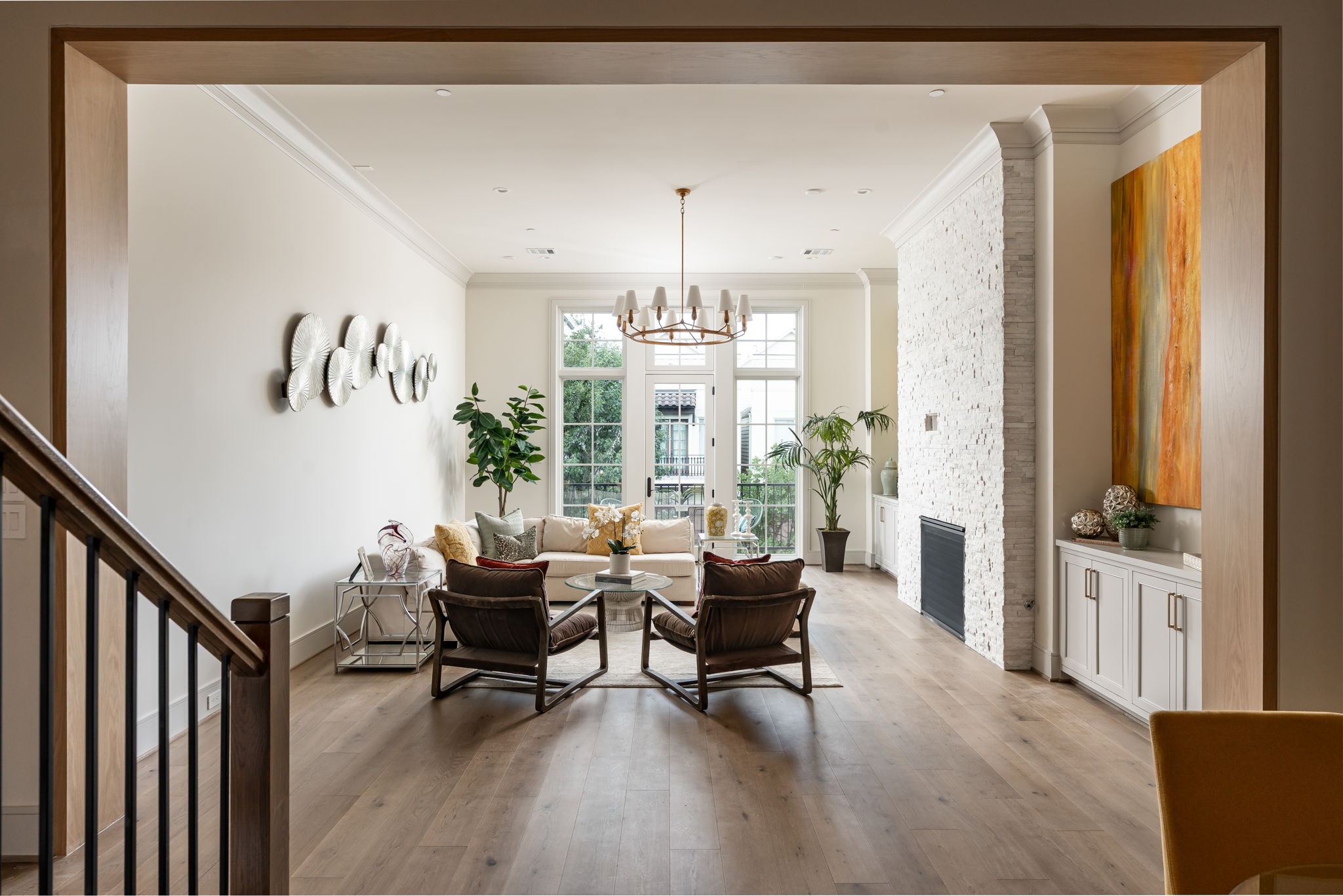 1215 West Pierce Street Houston, TX 77019 - Photo 15 of 40 The white oak-wrapped casement creates a dramatic division between the dining room and family room on the second floor. Large open rooms and high ceilings give this home a feeling that is both decadent and welcoming at the same time.