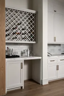 a bathroom with a sink vanity and a mirror