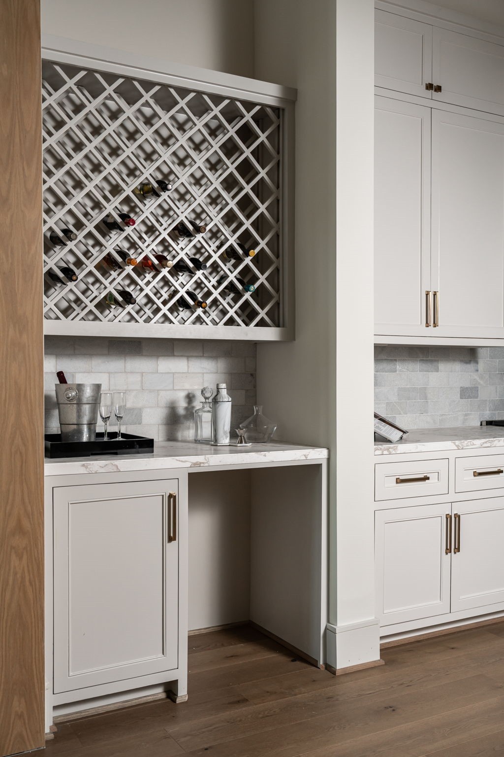 1215 West Pierce Street Houston, TX 77019 - Photo 23 of 40 Between the dining room and the kitchen is a butler's pantry with a spot for the to-be-installed beverage cooler.