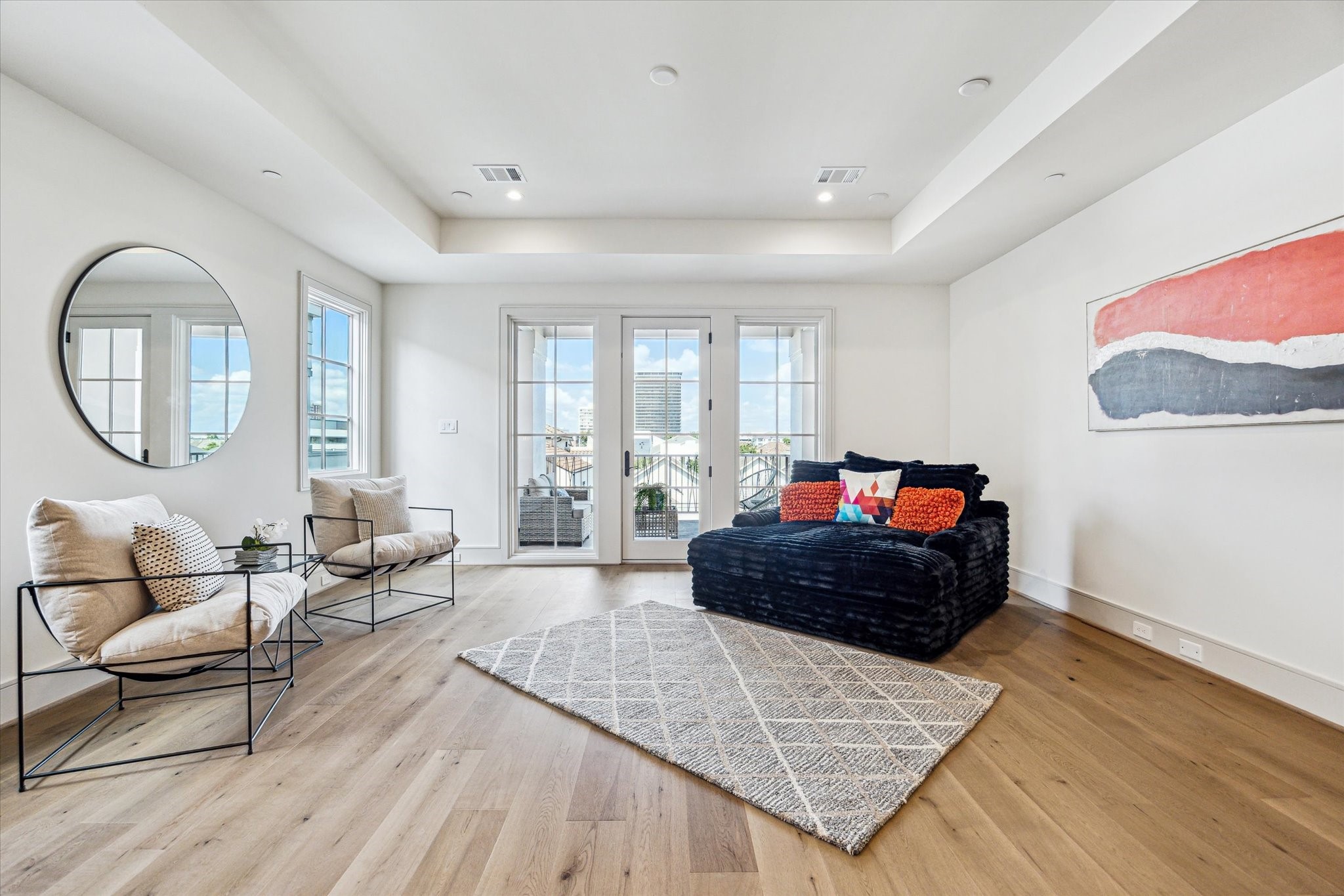 1215 West Pierce Street Houston, TX 77019 - Photo 34 of 40 Looking out from the wet bar shows the City Room opening onto the fourth floor covered terrace.