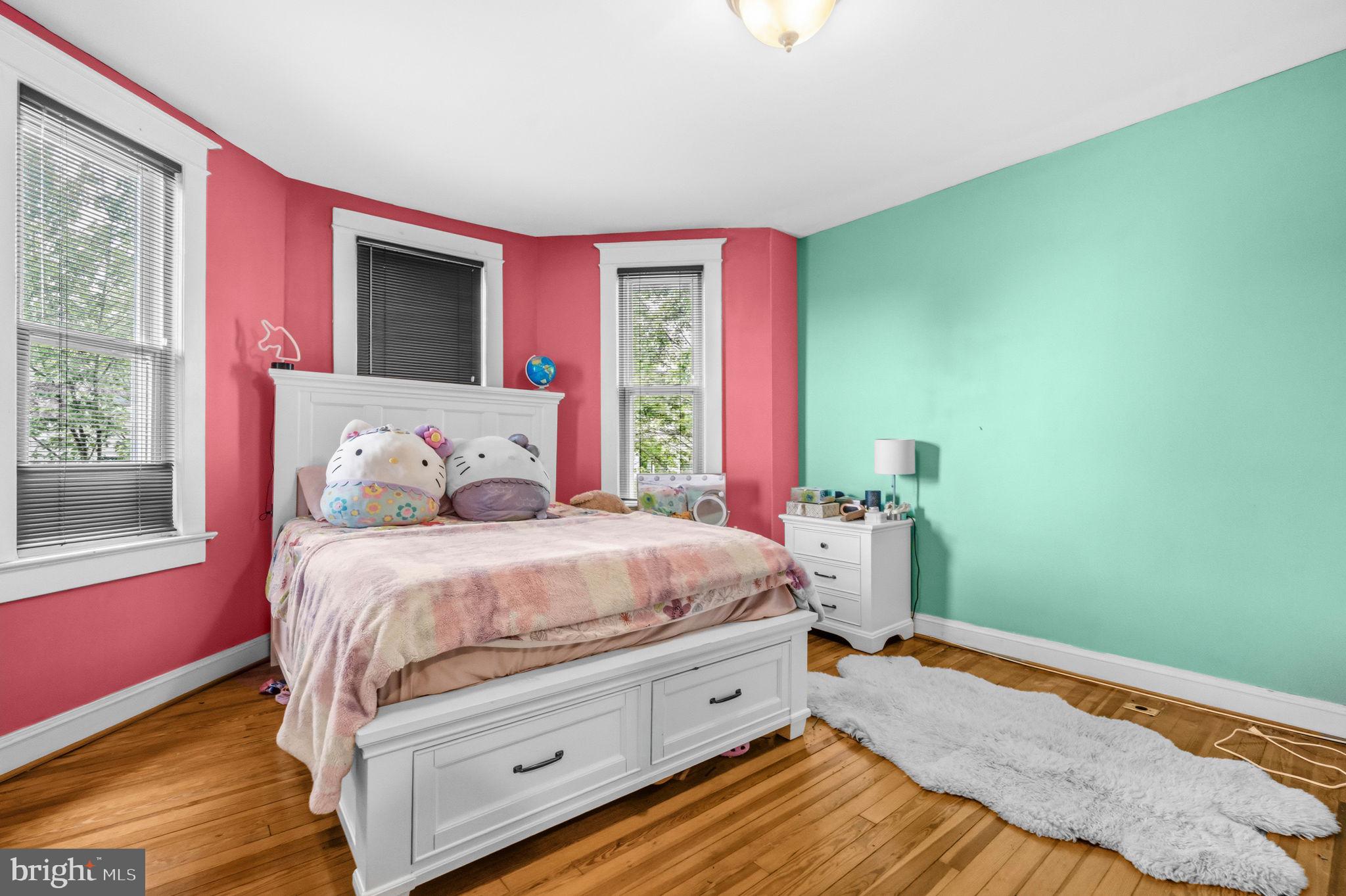 1824 3rd Street Northeast Washington, DC 20002 - Photo 13 of 30 Charming bedroom with vibrant hues.