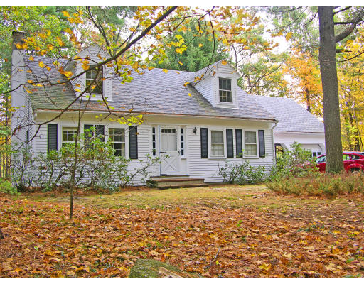 8 Pattee Road Harvard, MA 01451 - Photo 1 of 10 a front view of a house with garden