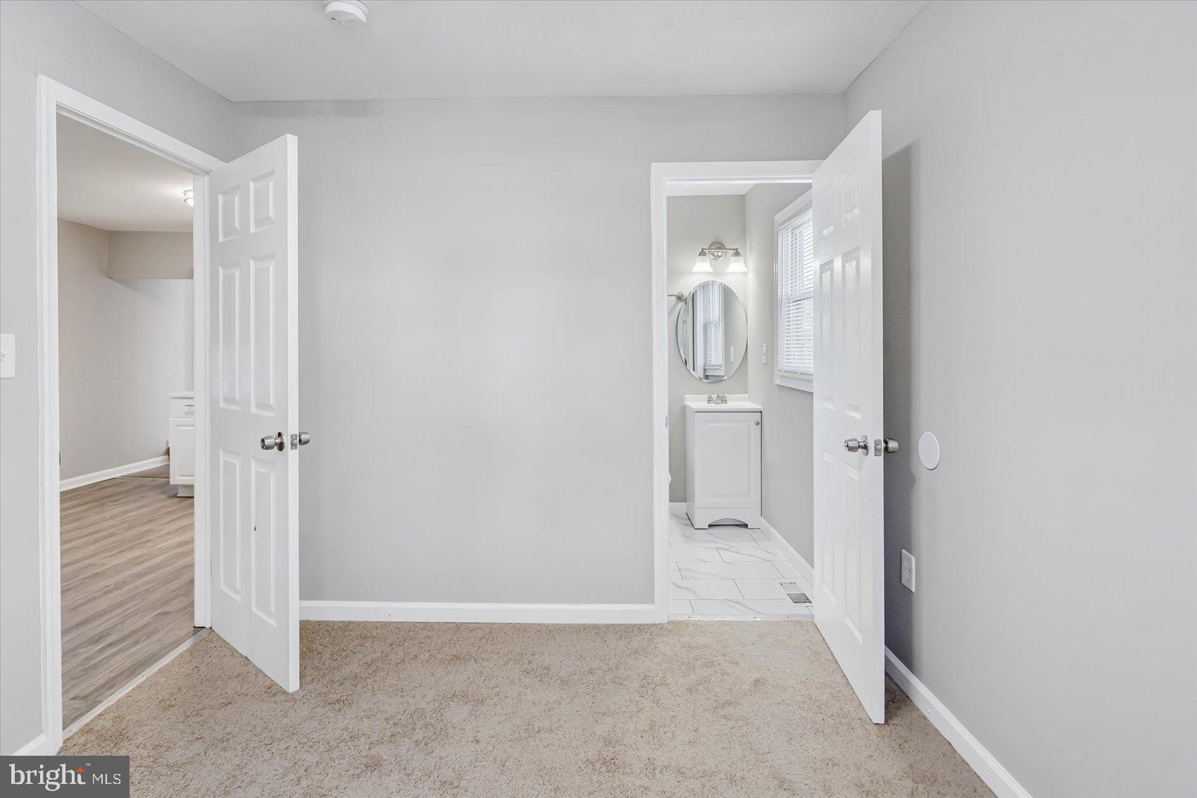 811 Rosedale Avenue Rosedale, MD 21237 - Photo 17 of 37 Bright and airy entryway with modern touches.