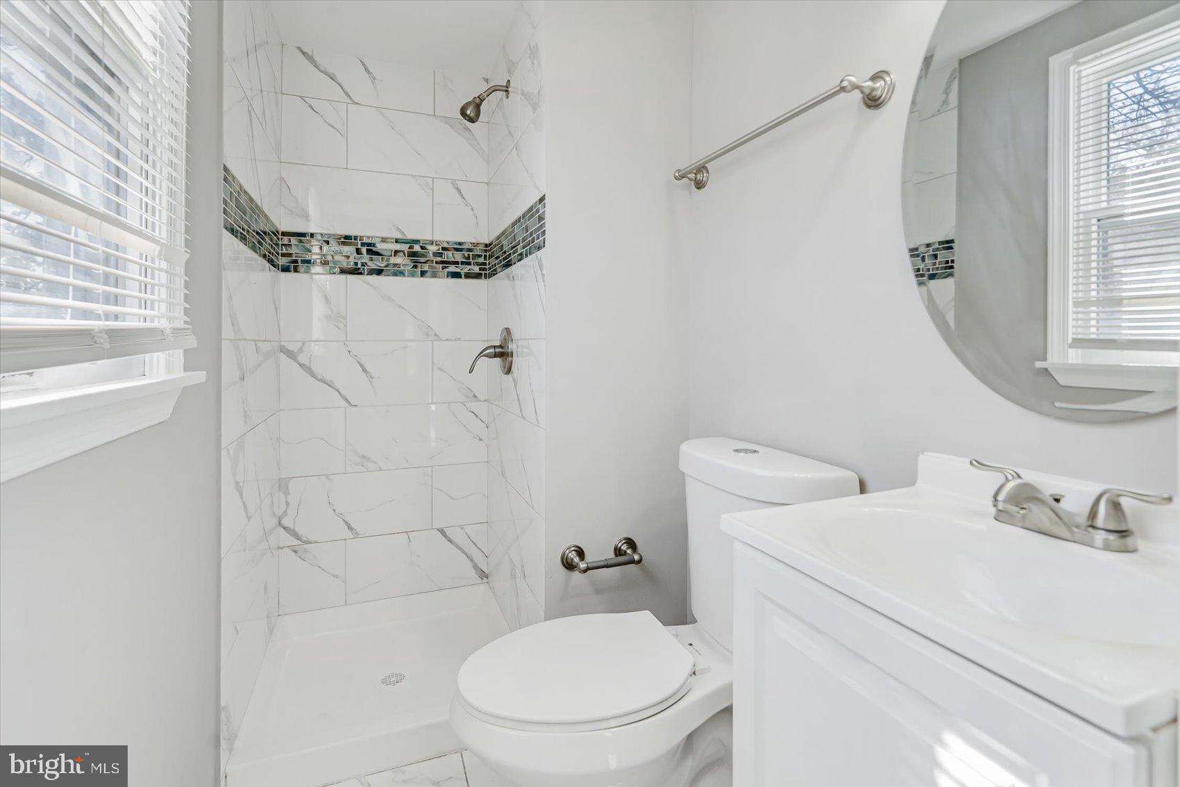 811 Rosedale Avenue Rosedale, MD 21237 - Photo 25 of 37 Modern bathroom with sleek finishes.