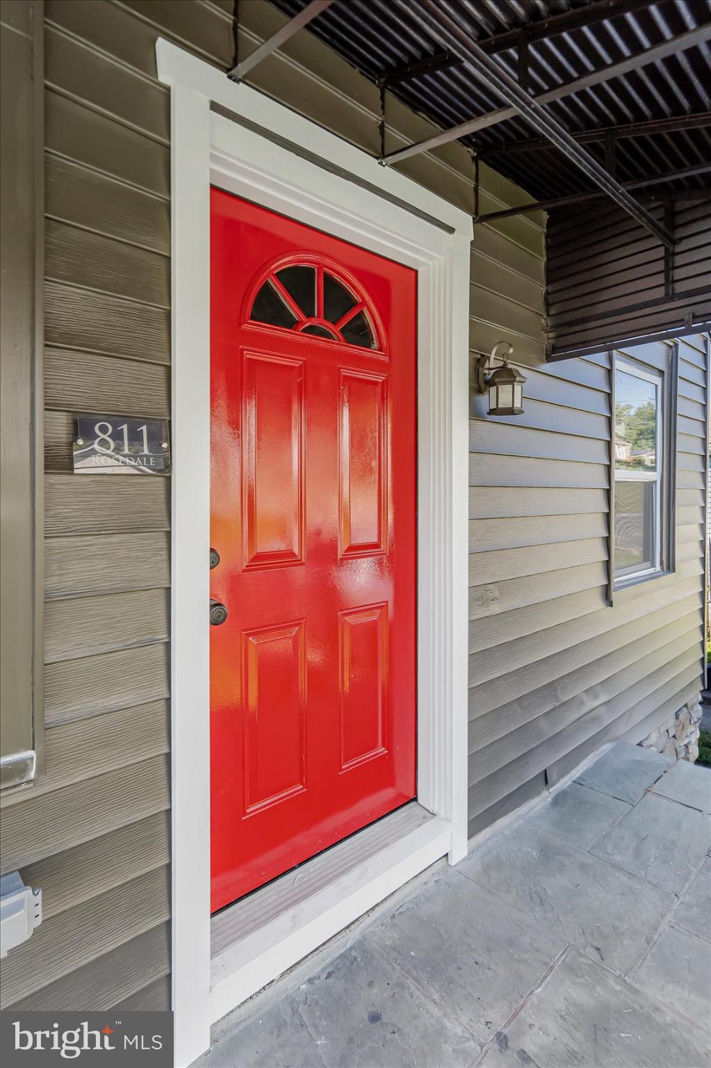 811 Rosedale Avenue Rosedale, MD 21237 - Photo 3 of 37 Vibrant red door welcomes you home.