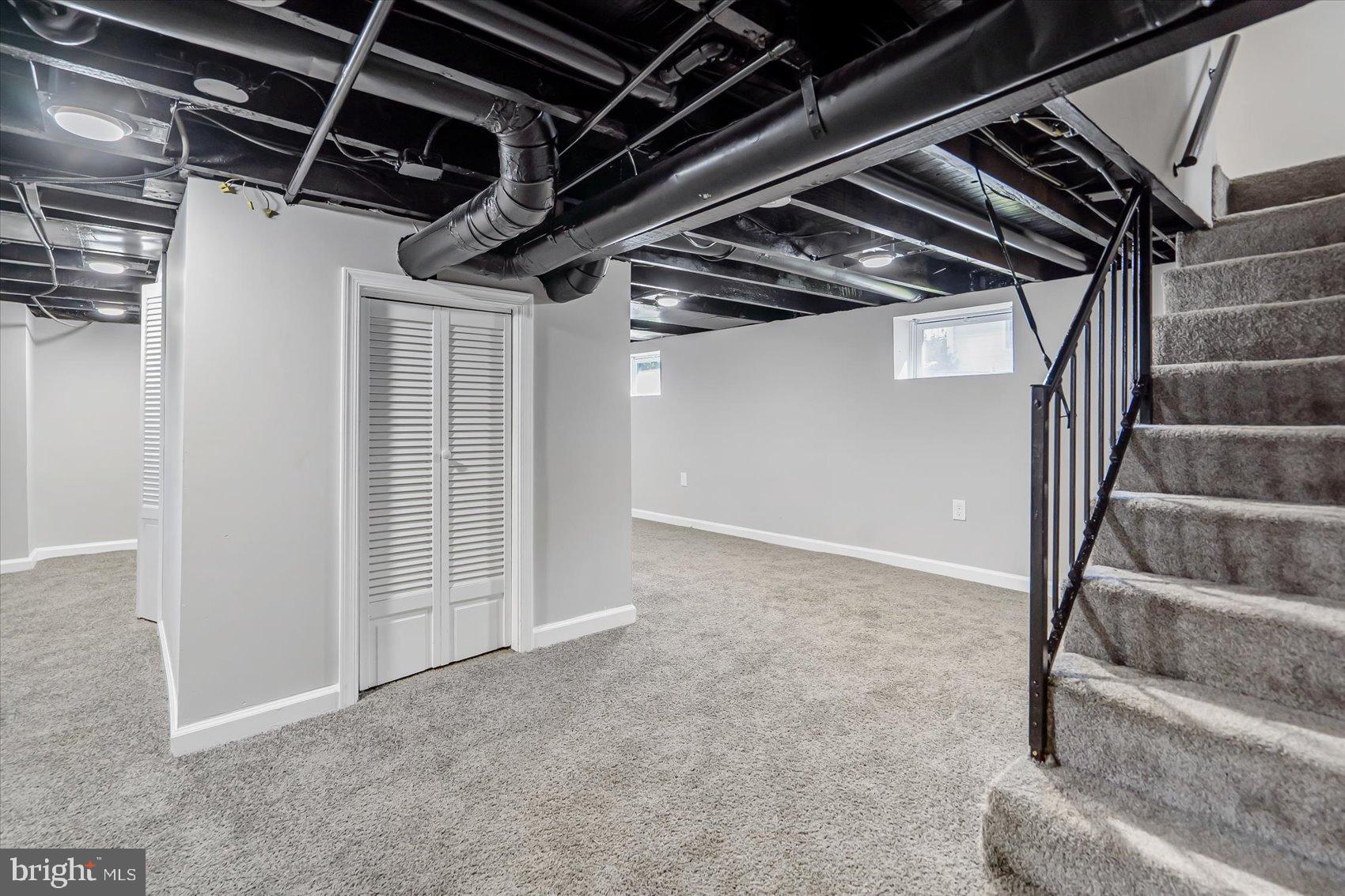 811 Rosedale Avenue Rosedale, MD 21237 - Photo 37 of 37 Spacious, versatile basement with modern finishes.
