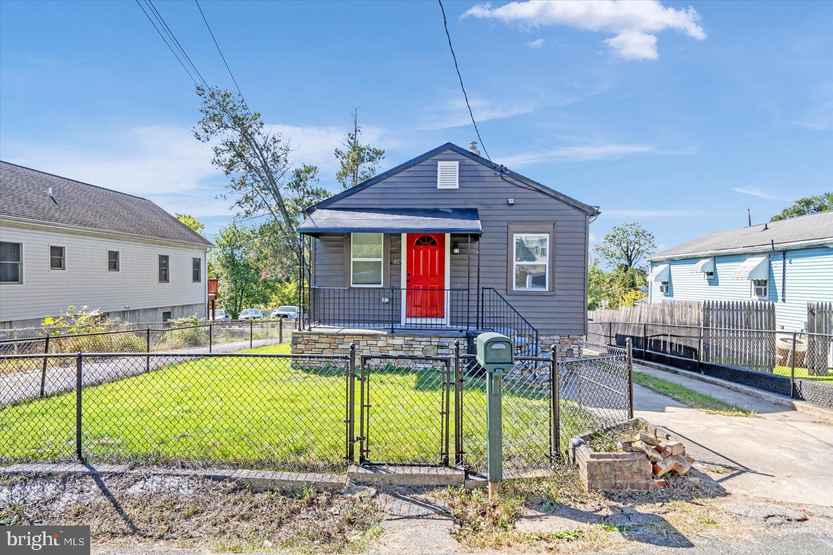 811 Rosedale Avenue Rosedale, MD 21237 - Photo 5 of 37 Charming home with vibrant red door.