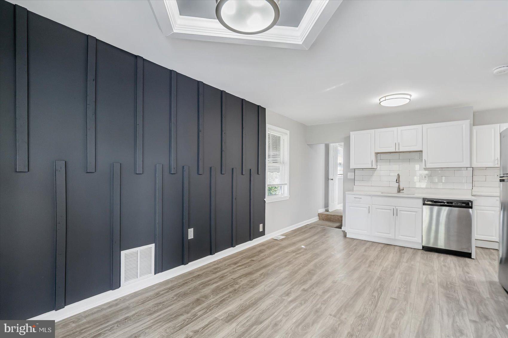 811 Rosedale Avenue Rosedale, MD 21237 - Photo 9 of 37 Modern elegance with bold accent wall.