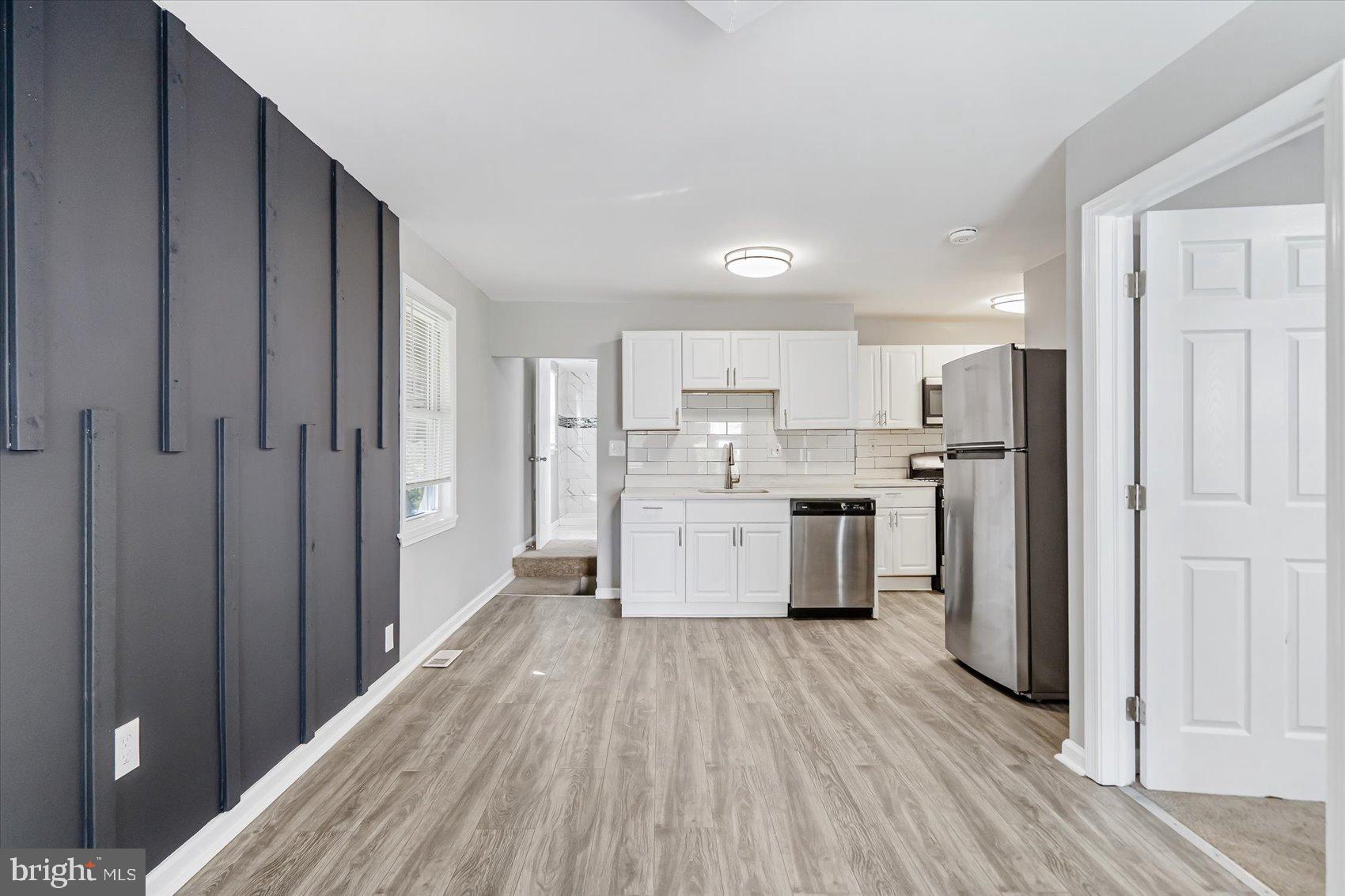 811 Rosedale Avenue Rosedale, MD 21237 - Photo 10 of 37 Modern kitchen with sleek design elements.