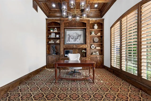 a view of a very nice looking dining room with furniture window and outside view