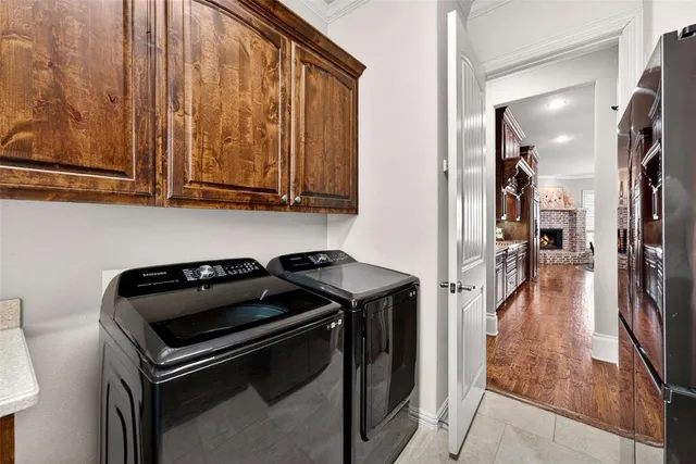 a kitchen with stainless steel appliances granite countertop a stove and a refrigerator