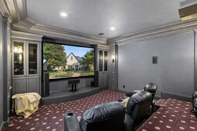 a living room with a couch and a large window