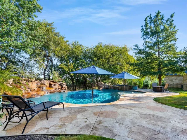 a garden view with a seating space