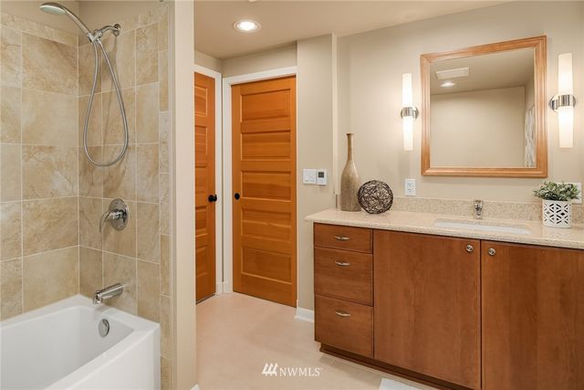 a view of a hallway with washer and dryer