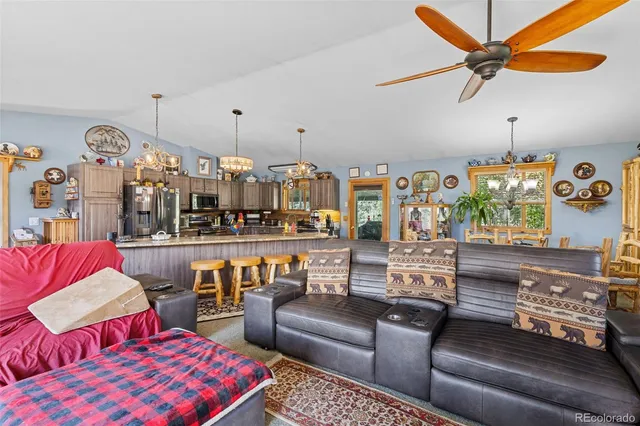 a kitchen with a table and chairs