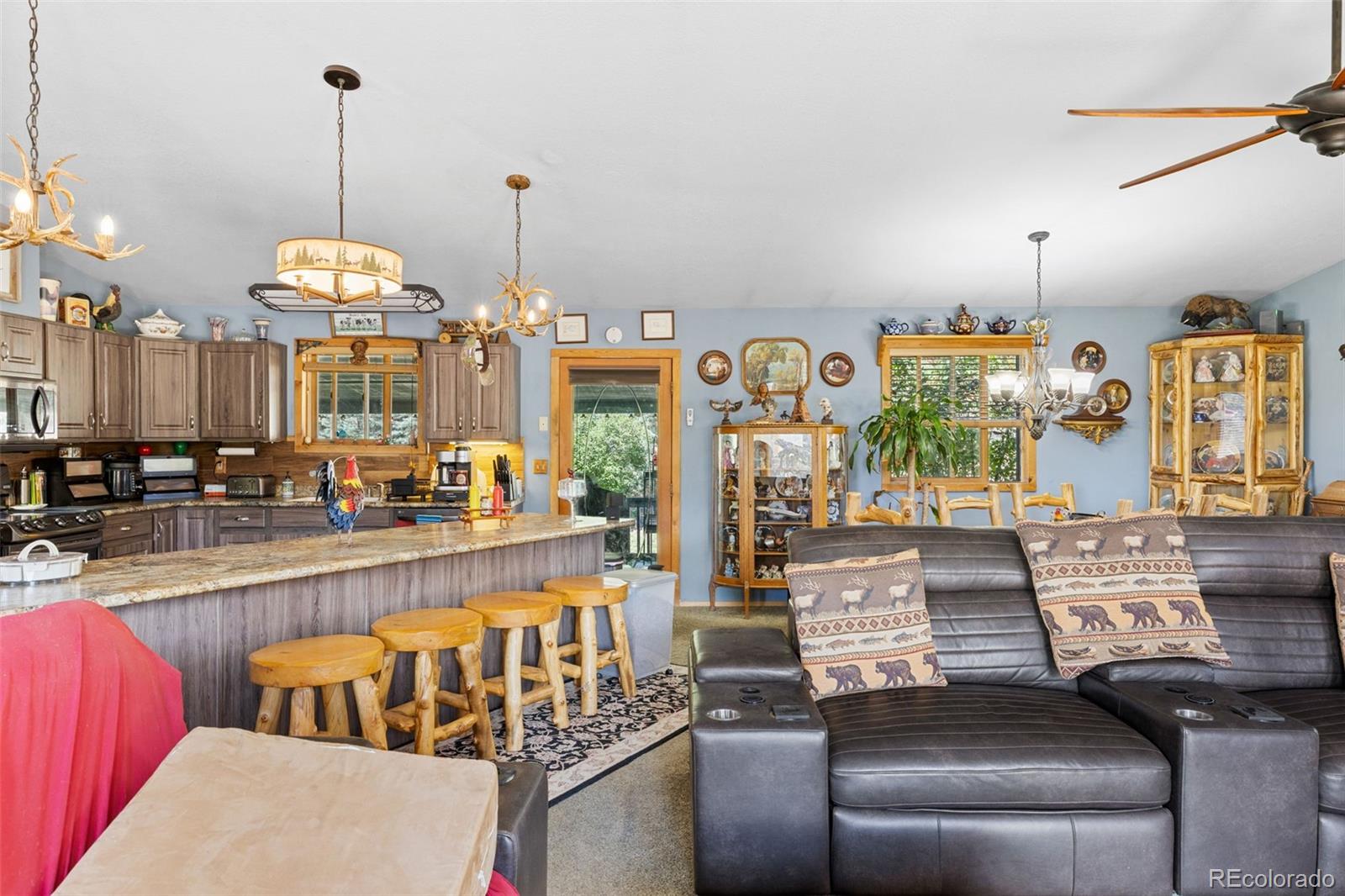 80 Fawn Road Bailey, CO 80421 - Photo 12 of 44 a kitchen with a table and chairs