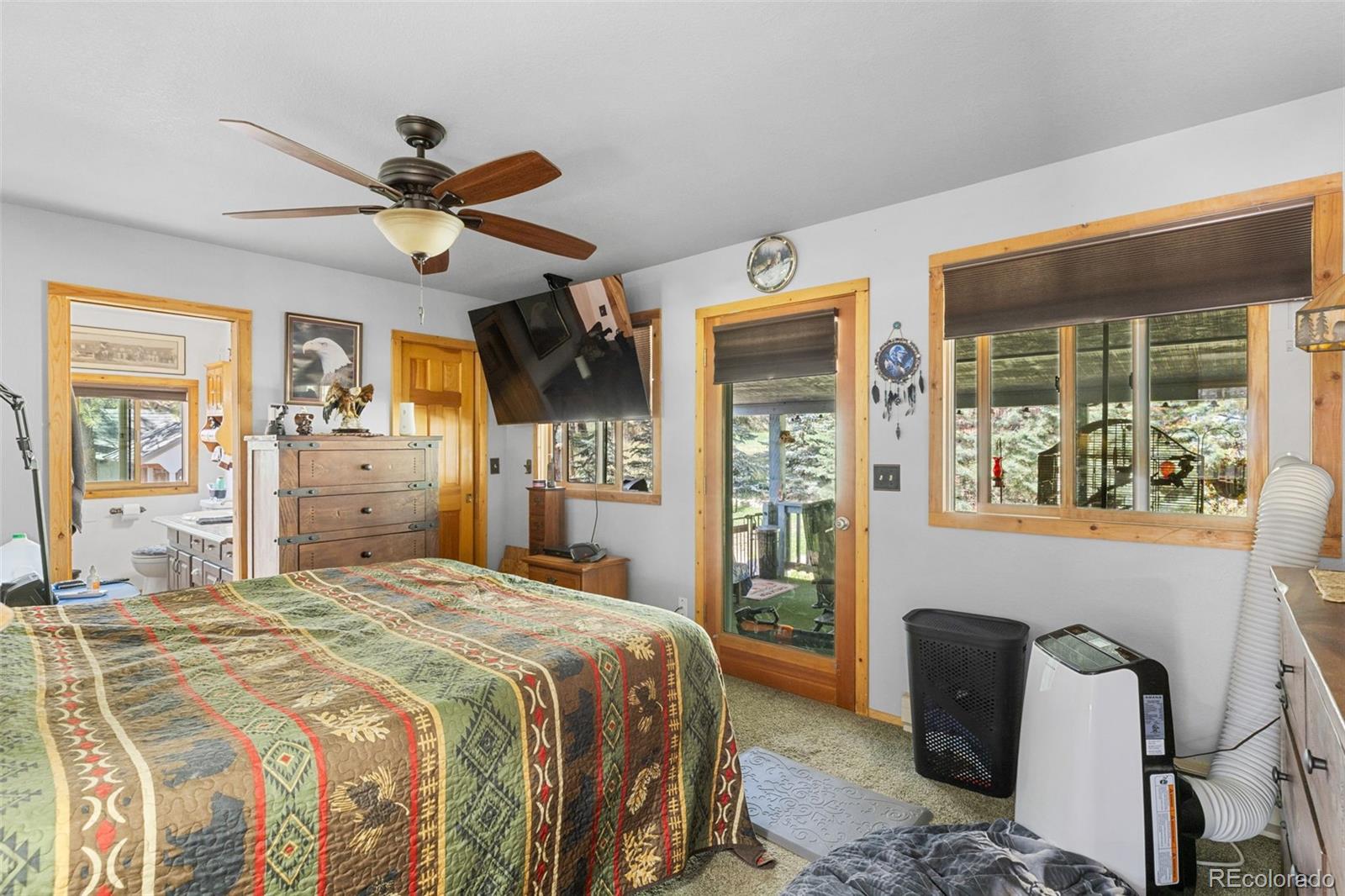 80 Fawn Road Bailey, CO 80421 - Photo 19 of 44 a bedroom with a bed and a window