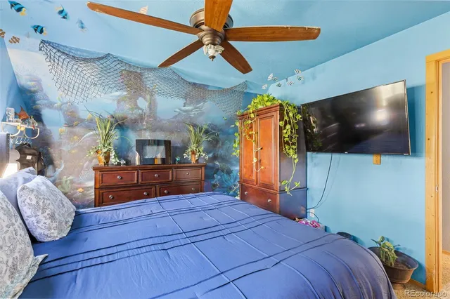 a bathroom with a sink mirror and shower